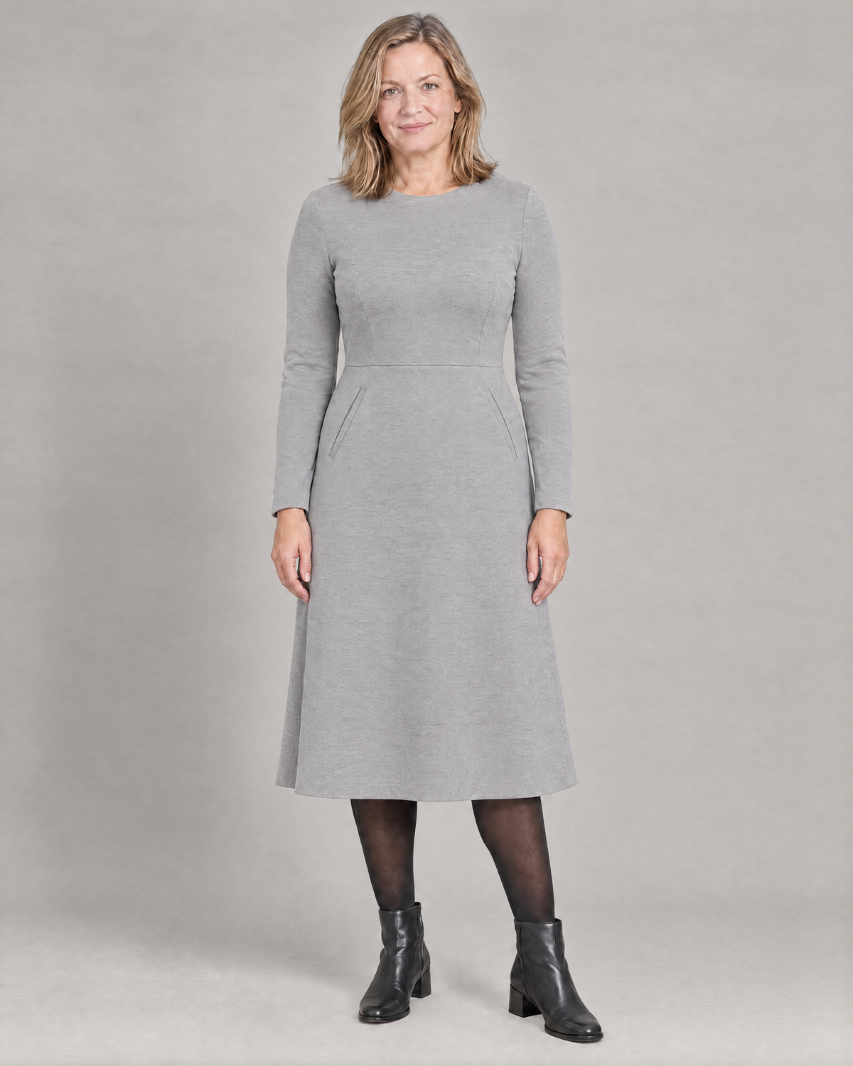 GLIDE light grey wool A-line midi dress with long sleeves and welt pockets, front view