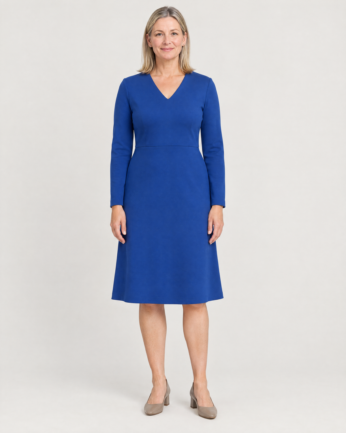 DESK cobalt blue long-sleeve A-line office dress with small V-neck, front view