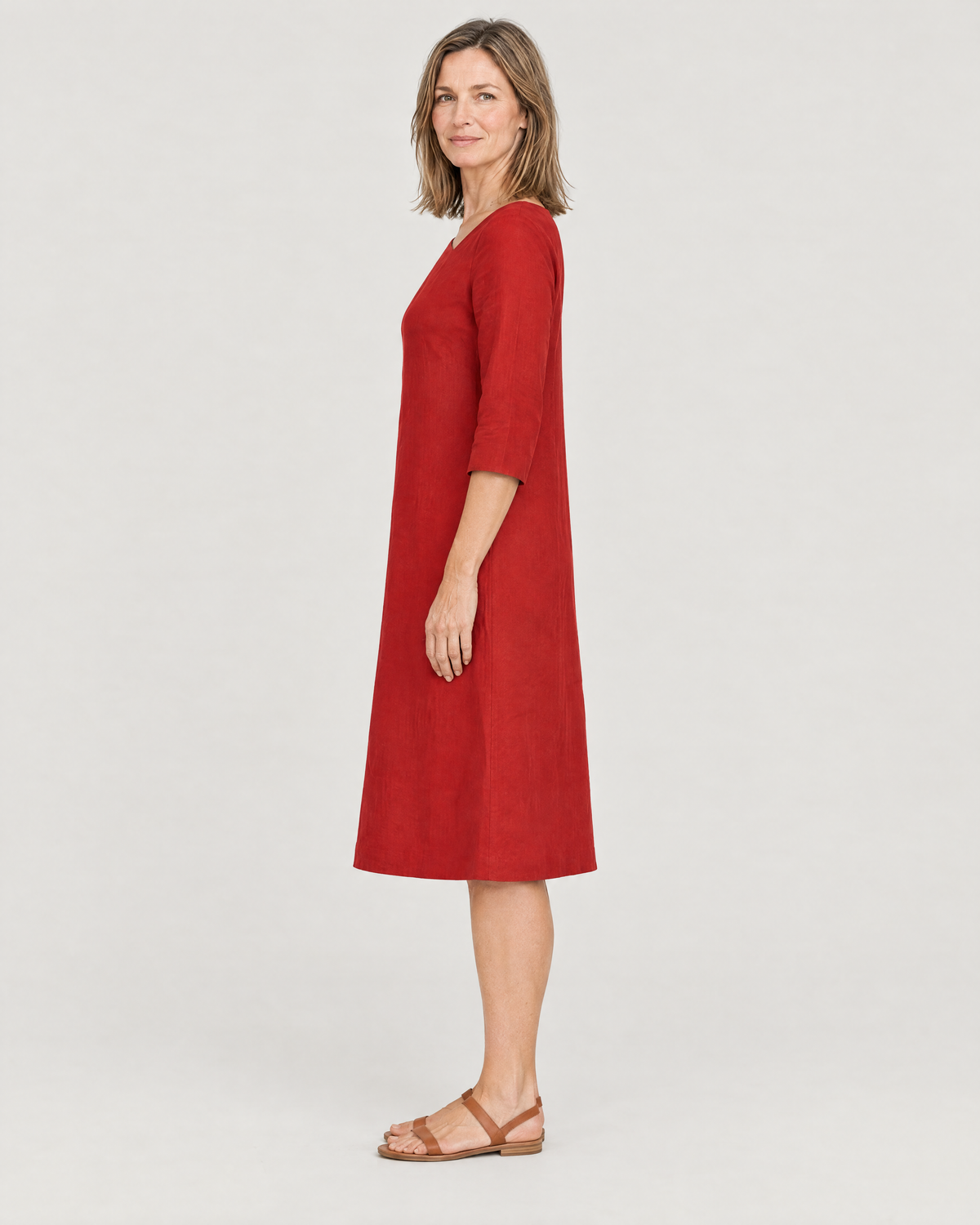 HUE red linen dress, side view showing the gentle A-line and below-the-knee length