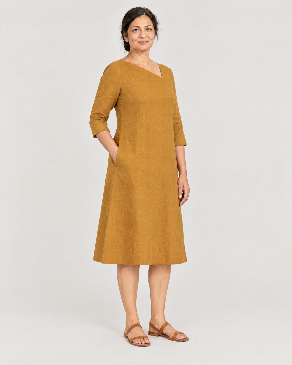 HUE ochre linen dress, three-quarter view