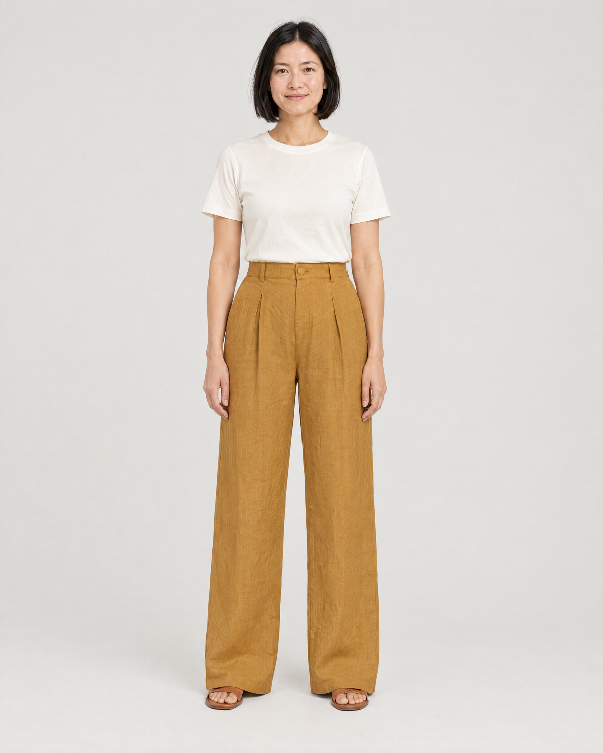 LYRA OPAQUE ochre linen pleated wide-leg trousers, front view