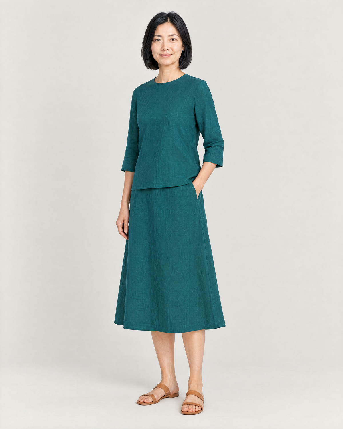 PAIR teal linen set, three-quarter view