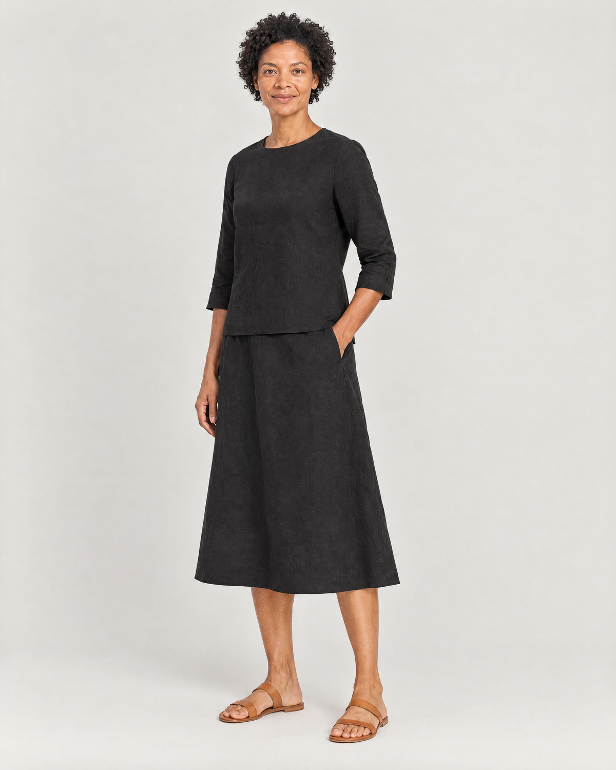 PAIR black linen set, three-quarter view