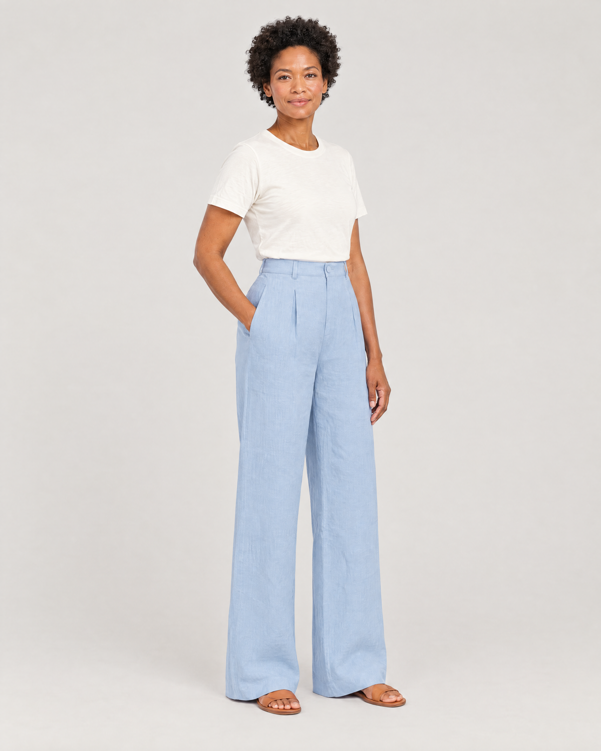 LYRA OPAQUE light blue linen wide-leg trousers, three-quarter view
