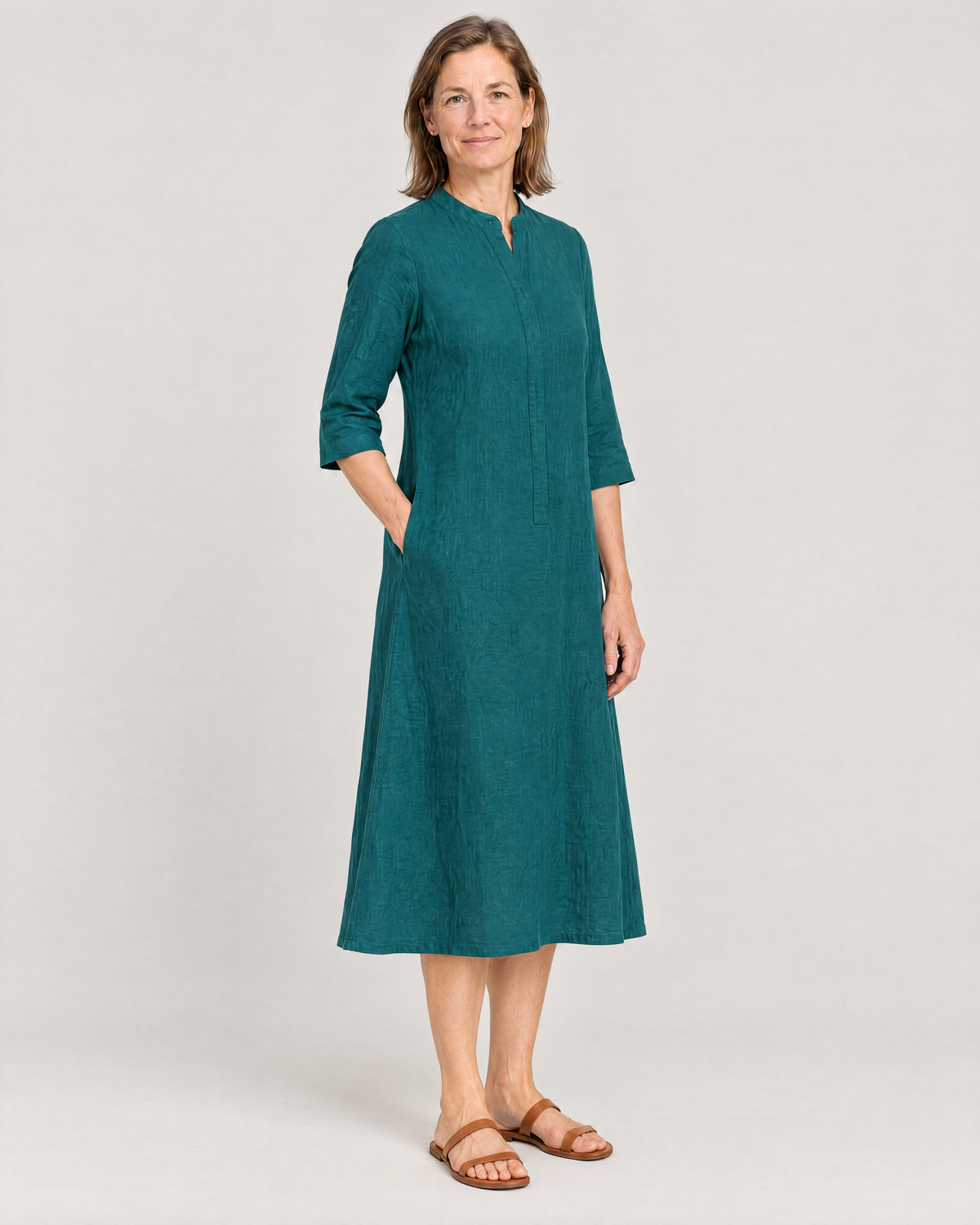 SUMMER COLOUR teal linen dress, three-quarter view with three-quarter sleeves