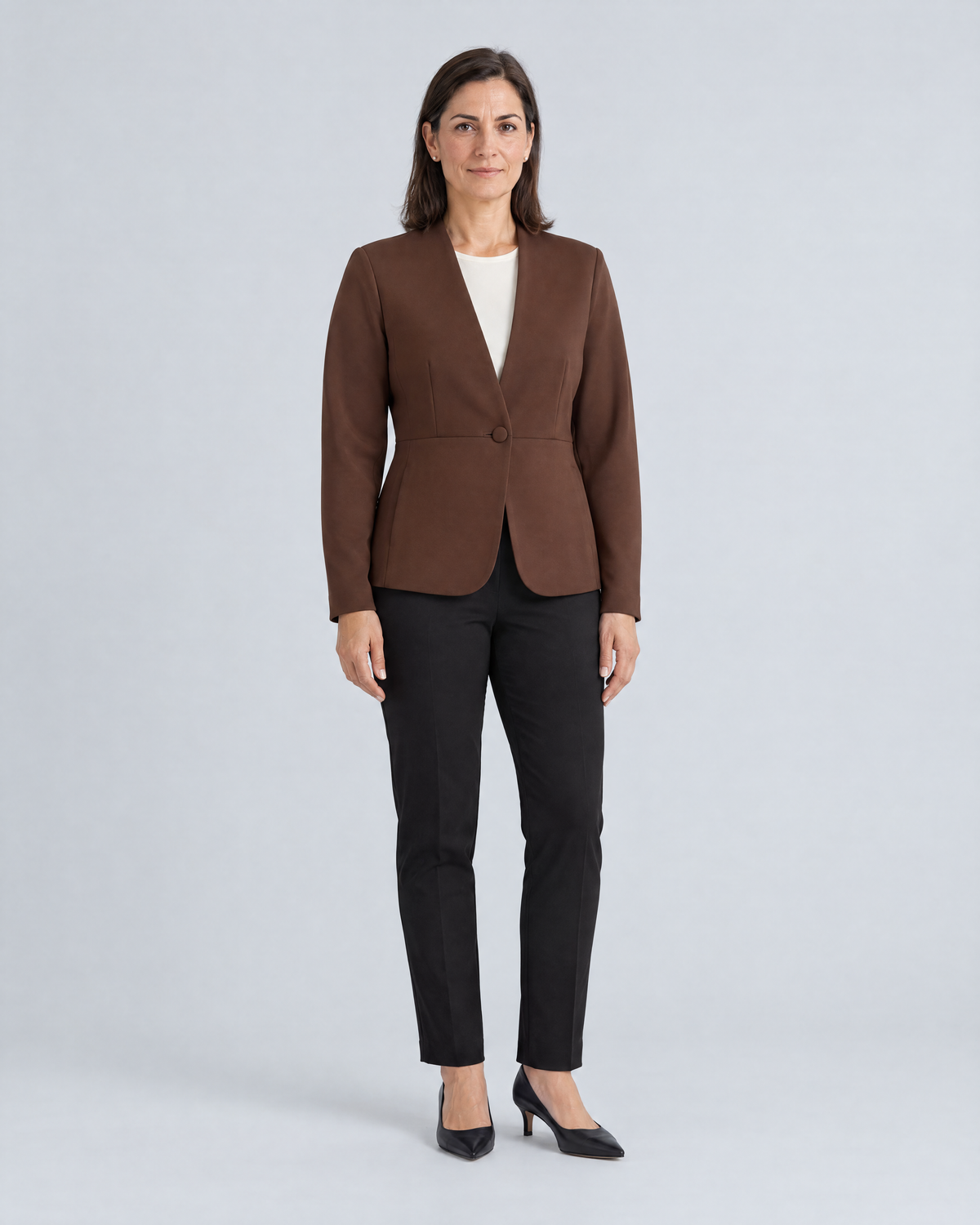 RIVA MOVE collarless jacket in brown Punto knit with one covered button and roomier sleeves, front view