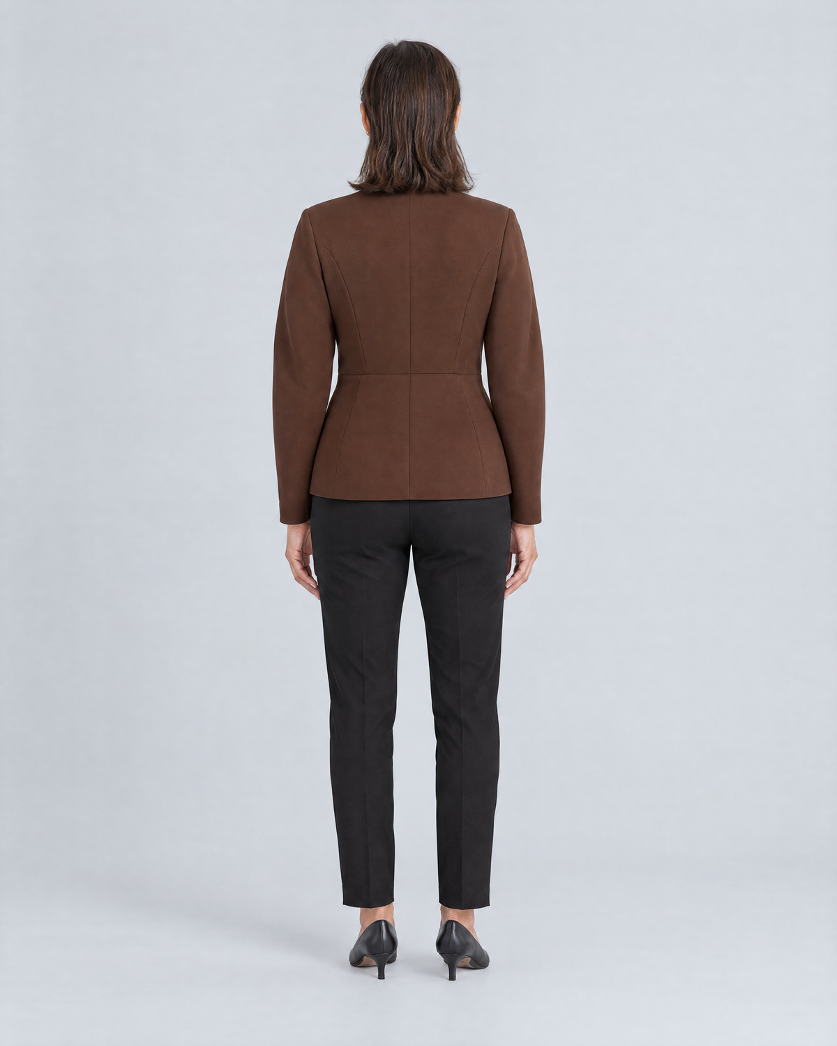 RIVA MOVE brown jacket, back view with princess seams and waist seam