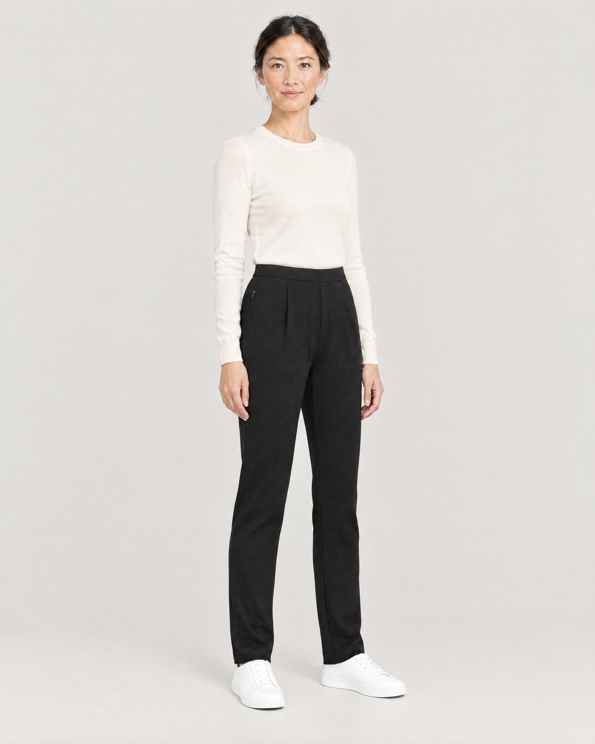 TRAVEL WARM black wool tapered trousers, Limited edition, three-quarter view