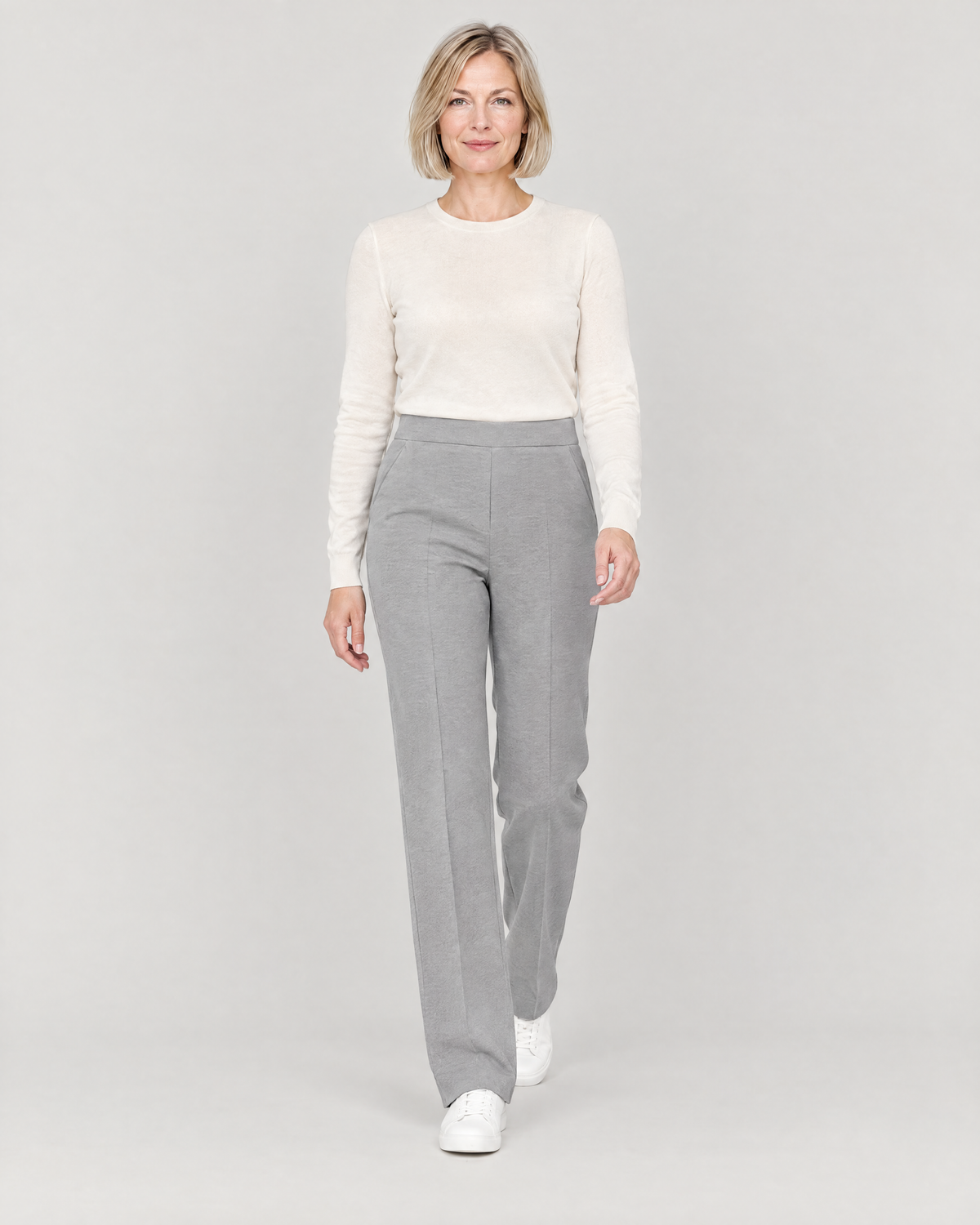 Woman walking in GRAPHITE STRAIGHT FIT light grey wool straight-leg trousers