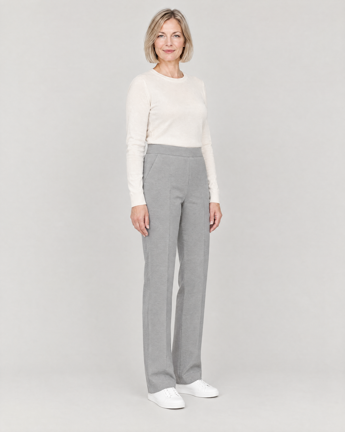 GRAPHITE STRAIGHT FIT light grey wool straight-leg trousers, three-quarter view showing the slanted pocket