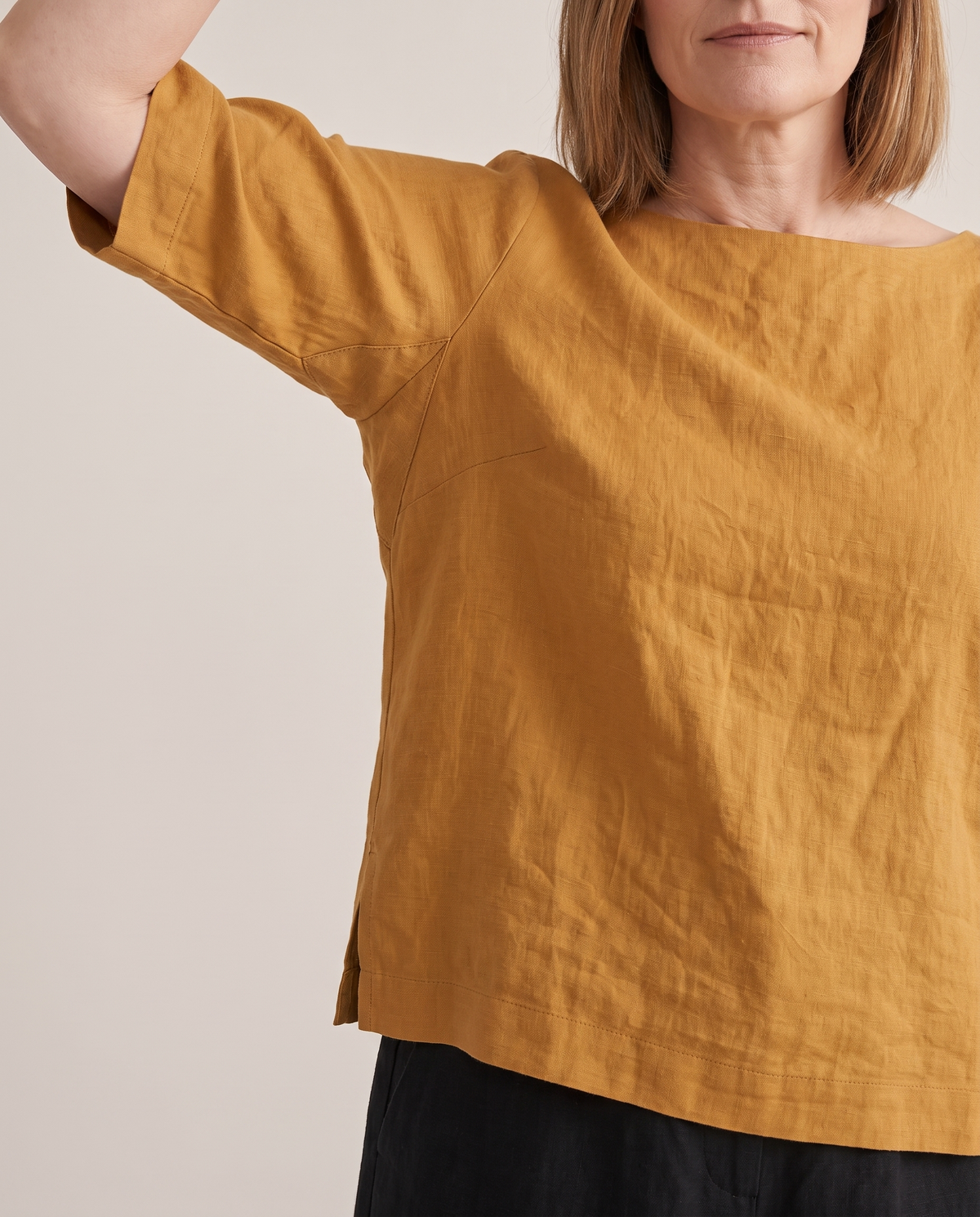 LIFT linen top in Ochre, underarm gusset and linen texture detail