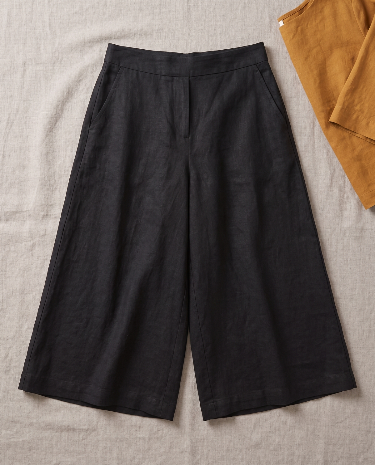 SWAY linen midi culottes in Black laid flat