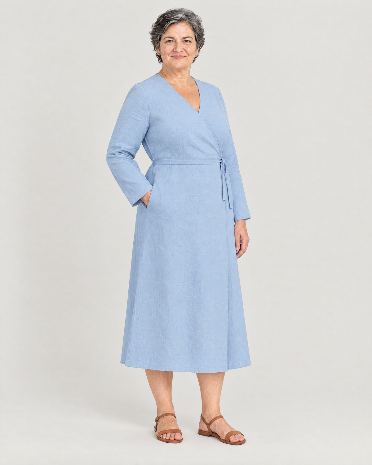 HOLD linen wrap dress in Light Blue, three-quarter view