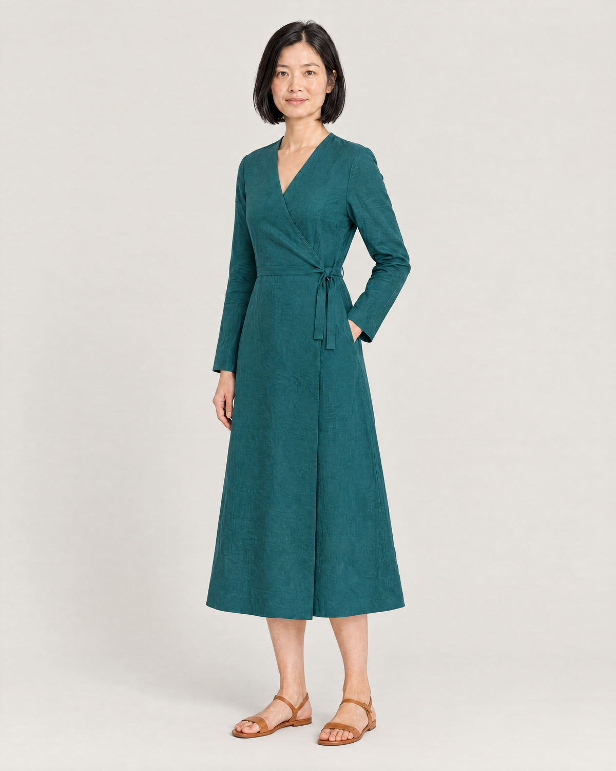 HOLD linen wrap dress in Teal, three-quarter view