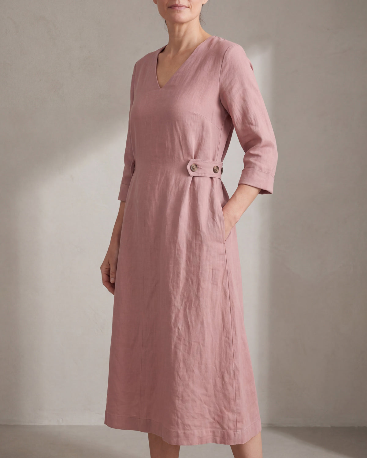 IDA linen A-line midi dress in dusty rose with side button tabs, front