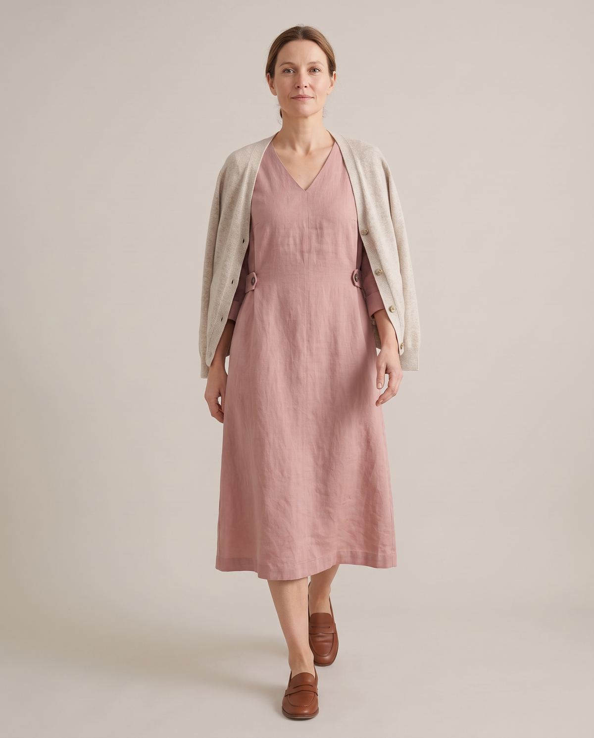 IDA dusty rose linen midi dress walking, cardigan over the shoulders