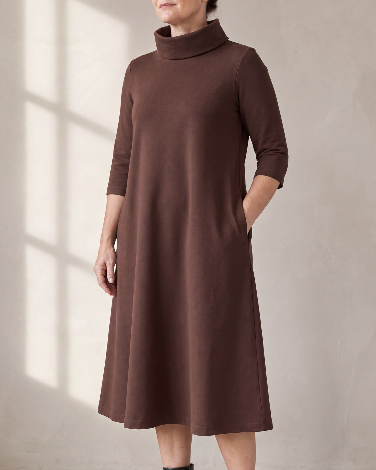 KIND brown knit A-line midi dress with funnel collar, close front view