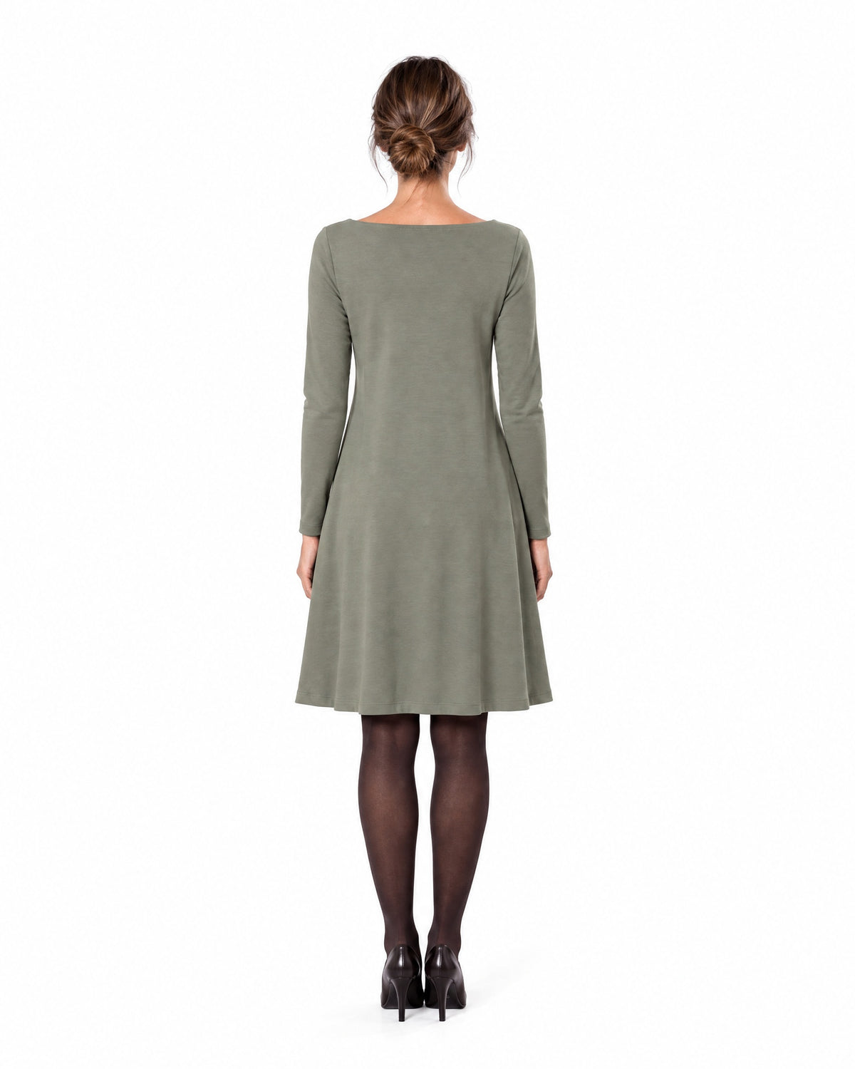 A woman modeling a gray-green long-sleeve A-line dress with a boat neckline, seen from behind showing the back and A-line skirt. #Color_Gray green