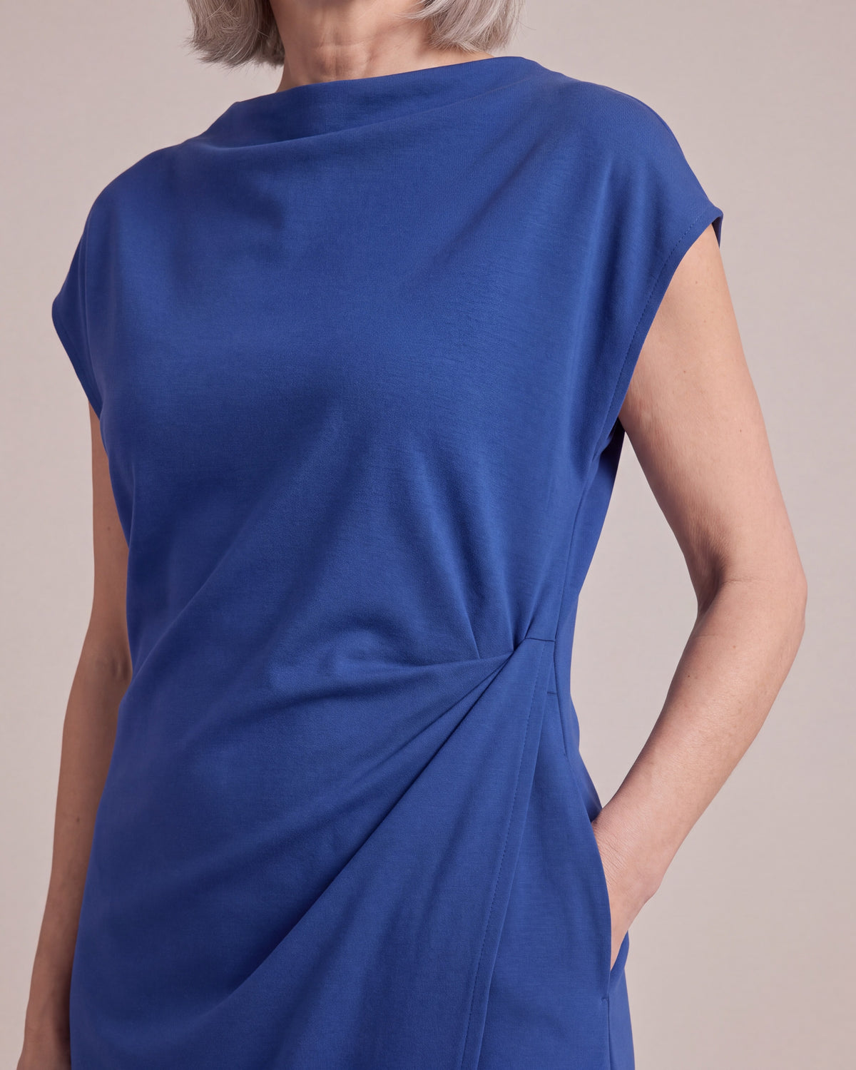 LIVIA cobalt dress, close-up of the side drape, neckline and pocket