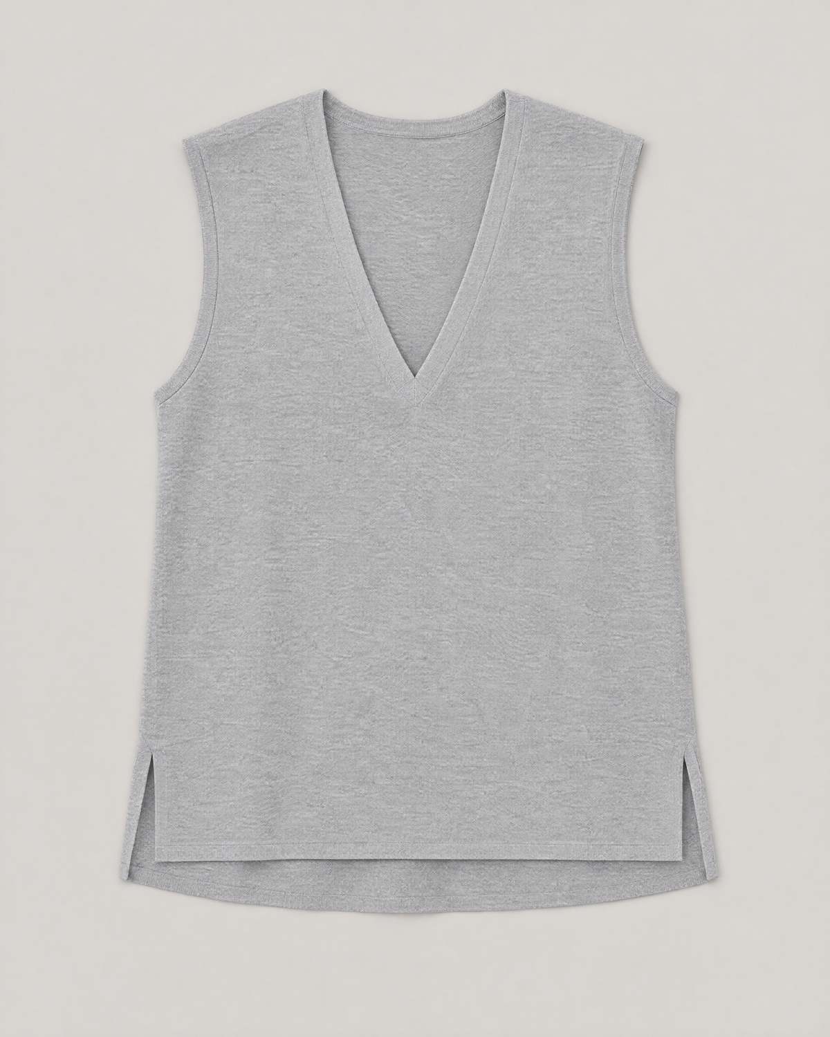 LIGHT VEST light grey laid flat, showing the V-neck, side slits and longer back