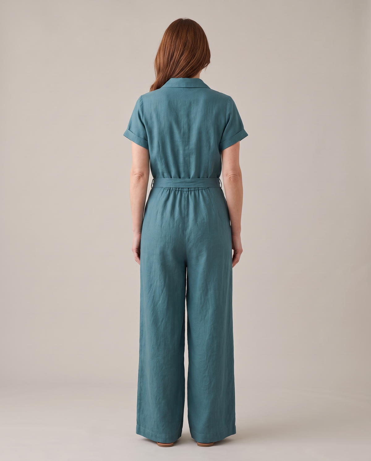 ONE linen wide-leg jumpsuit in Teal, back view without fastening