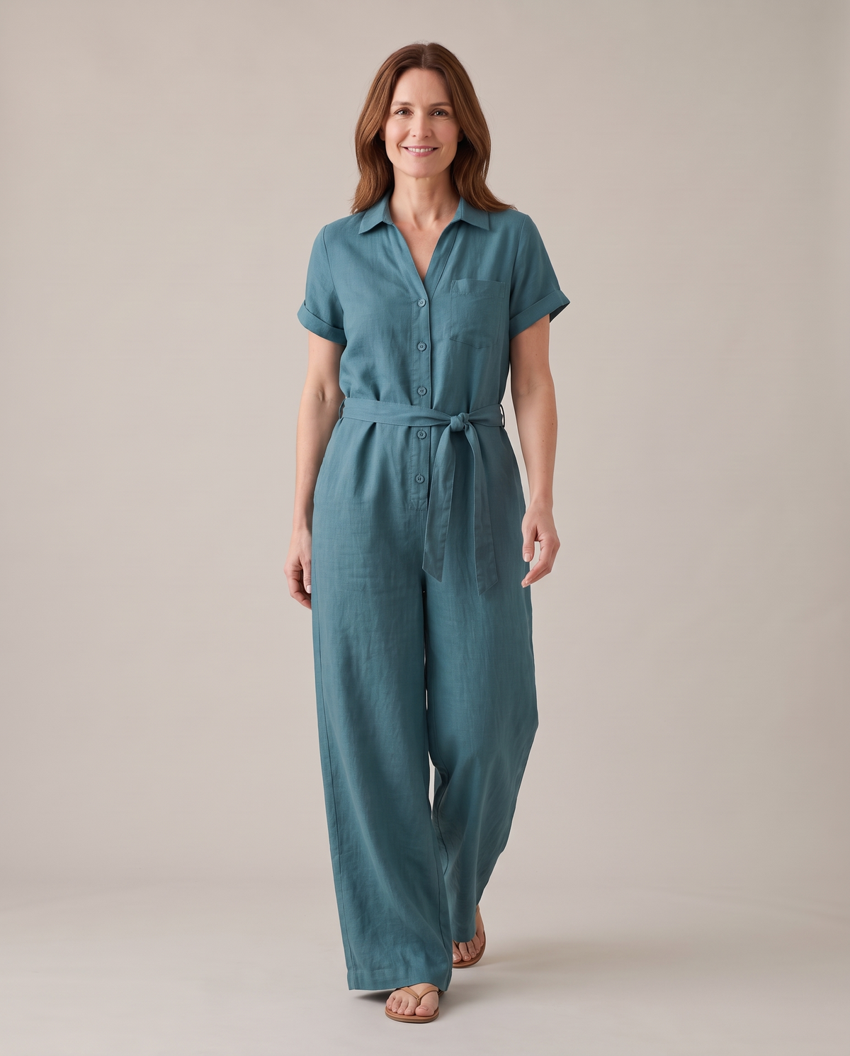 ONE linen wide-leg jumpsuit in Teal, walking
