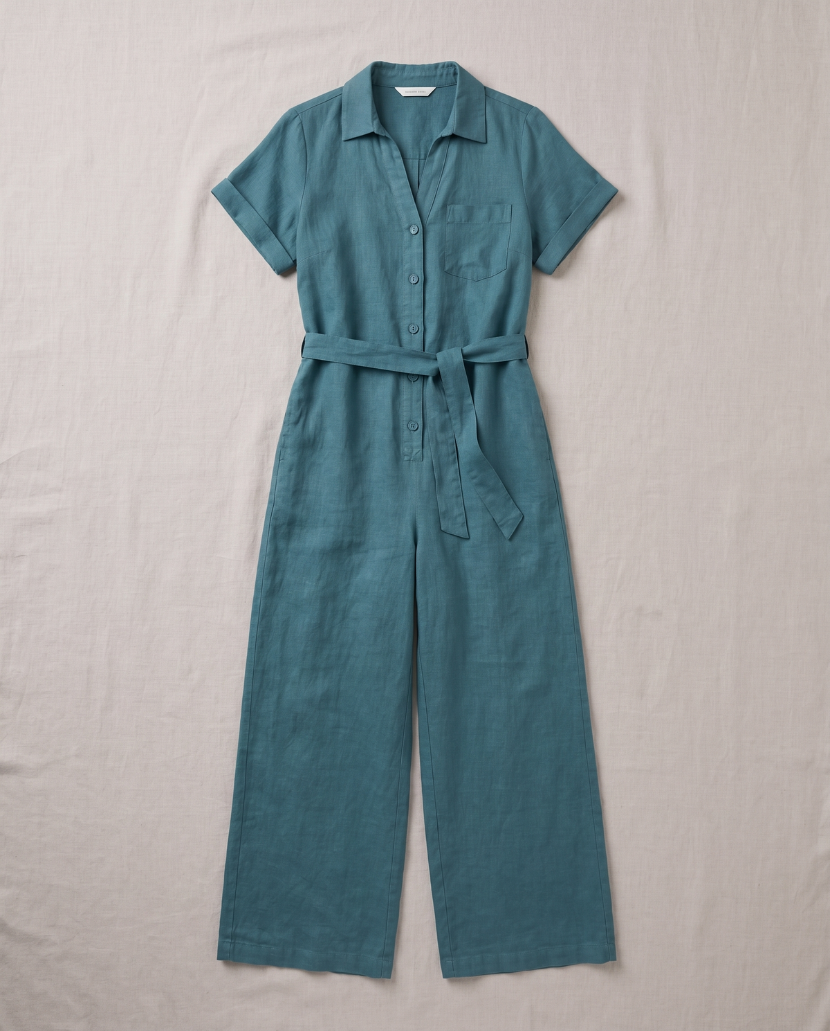ONE linen wide-leg jumpsuit in Teal, flat lay
