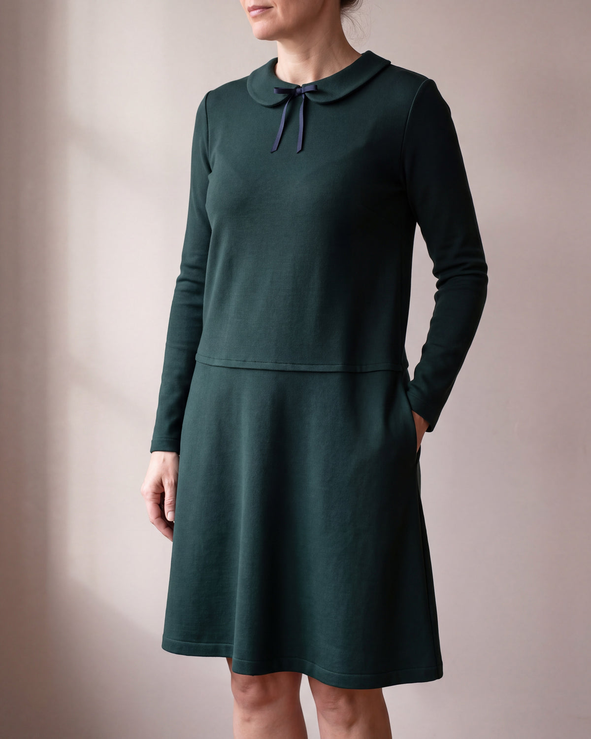 PARISIAN green Punto Milano bow collar drop-waist dress, close front view