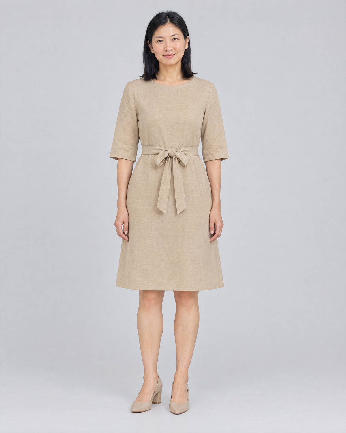 REACH linen dress in Beige, front view