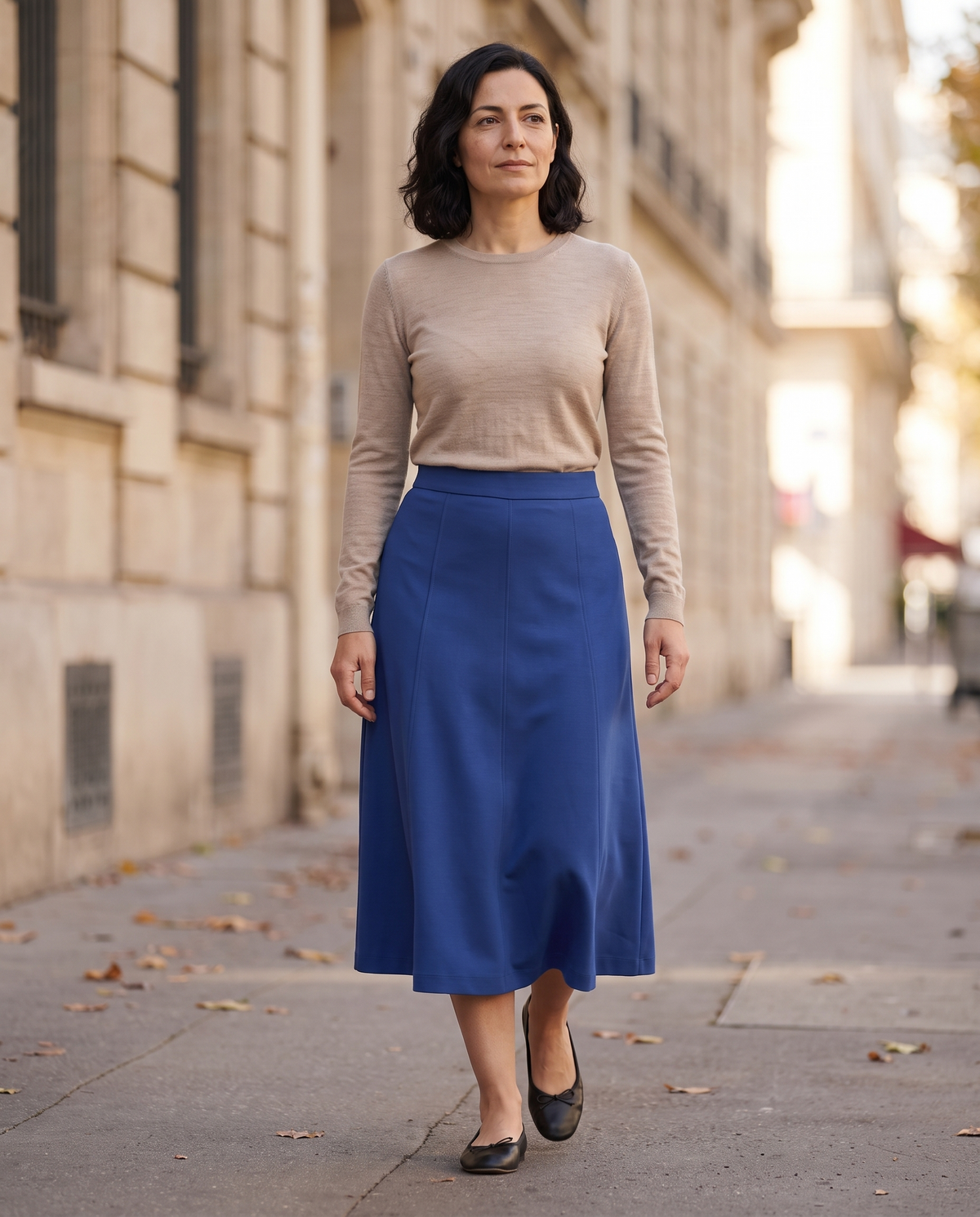 STEP midi skirt in Cobalt, three-quarter view on a city street