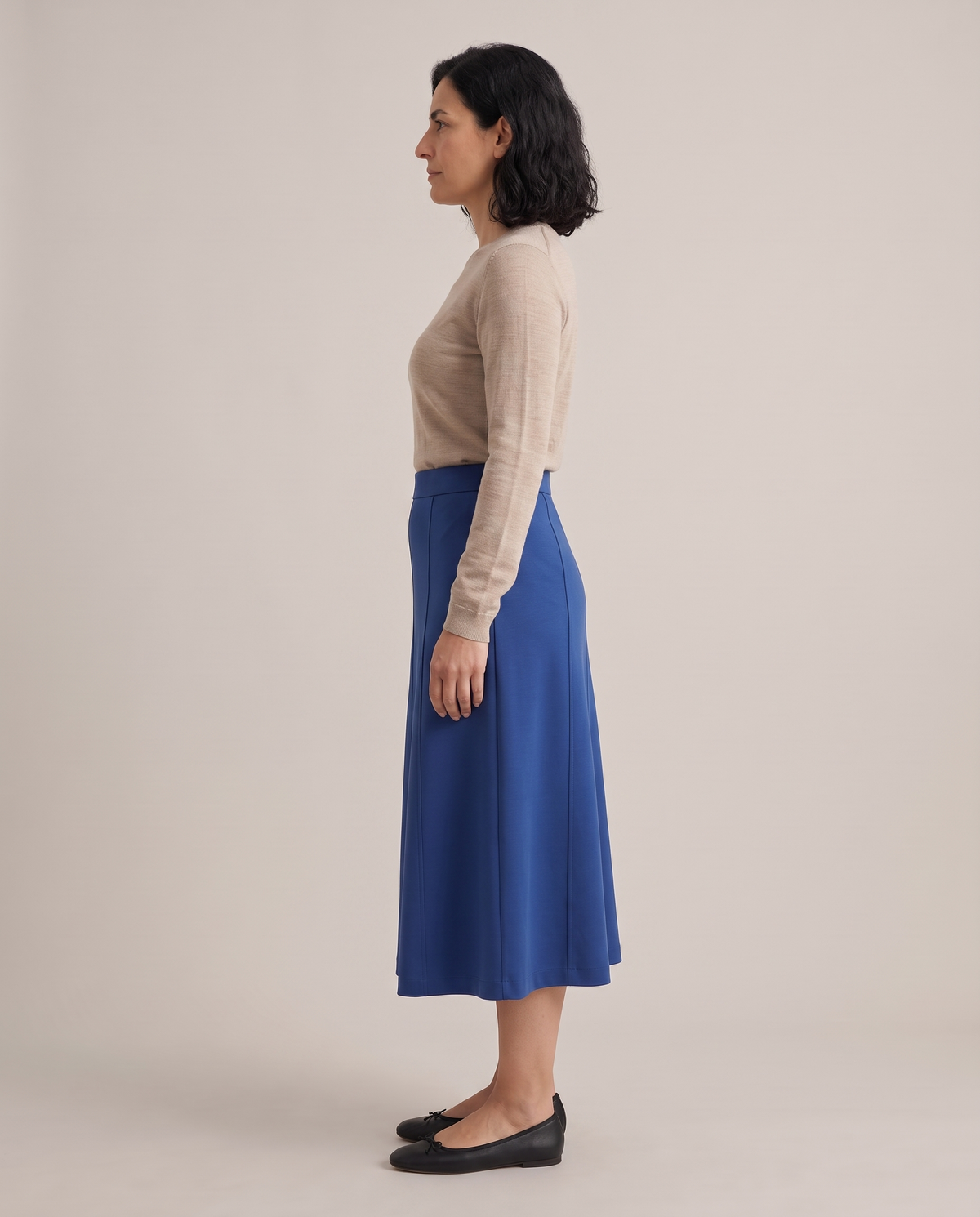STEP midi skirt in Cobalt, side view of the gentle A-line
