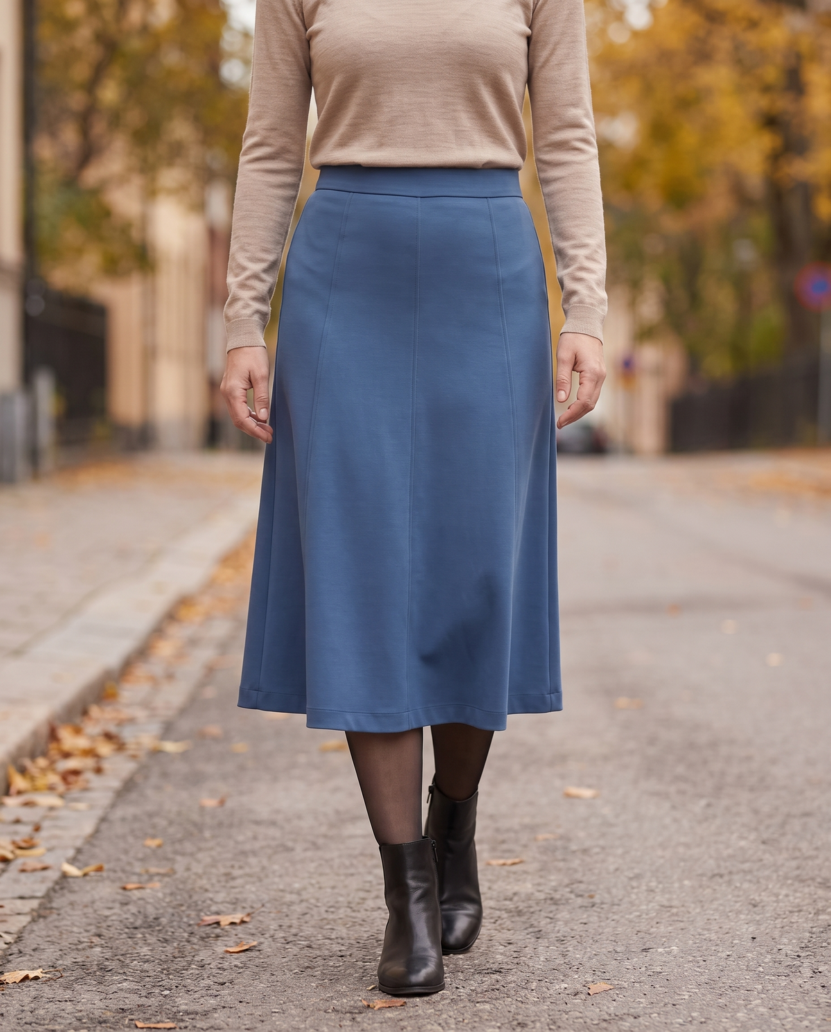 STEP midi skirt in Blue worn with tights and ankle boots