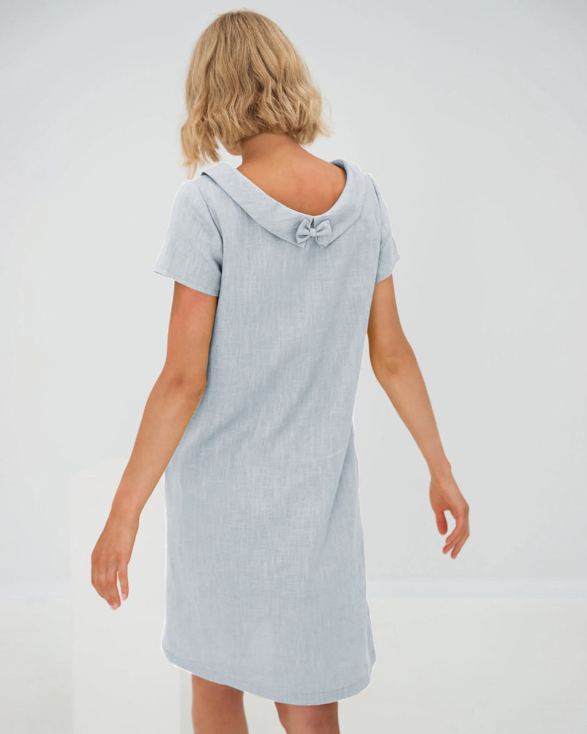 LeMuse STORY linen dress in light blue – studio side view #Color_Light blue