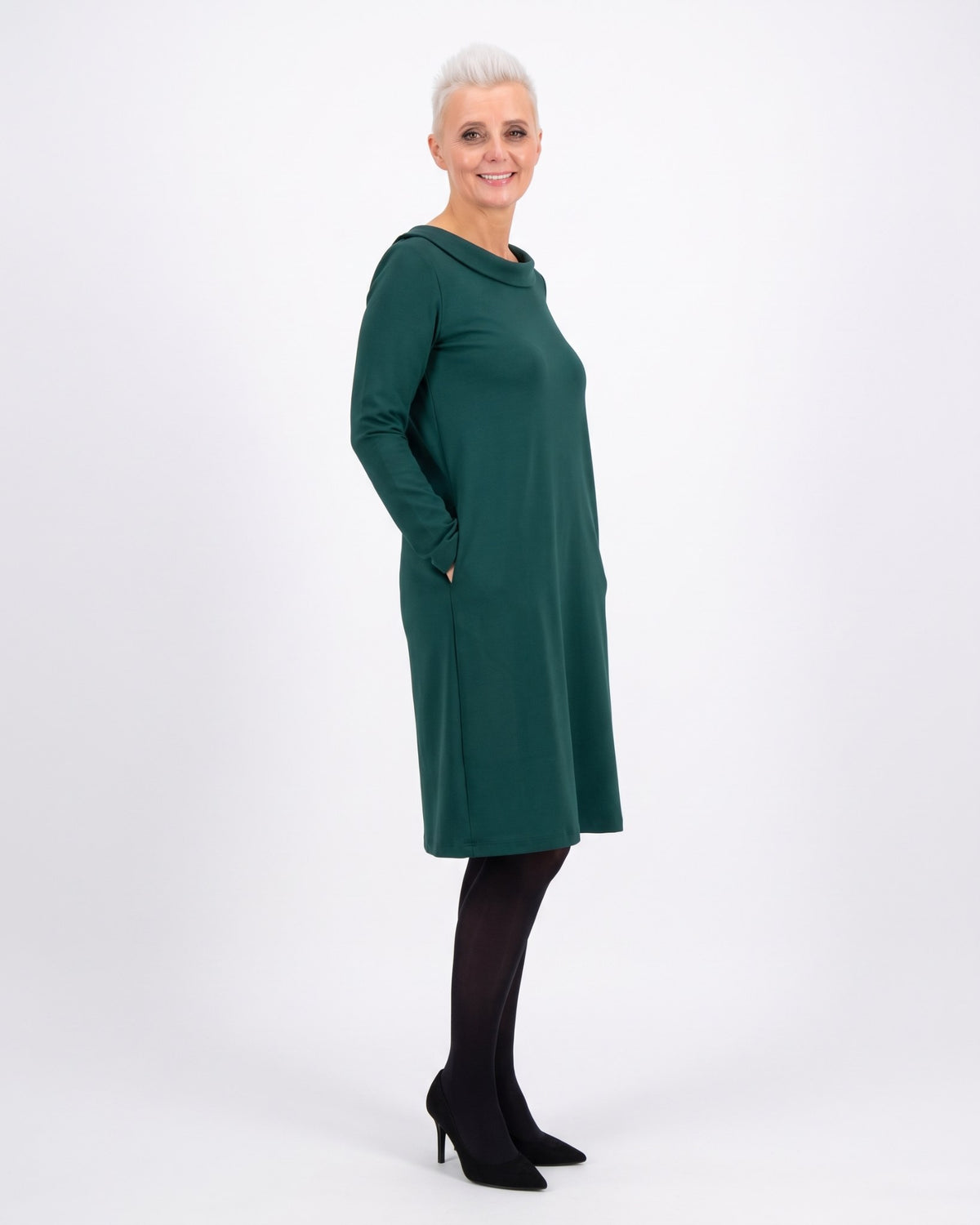 STORY Punto Milano – green dress, side view showing how the A-line skirt falls #Color_Green