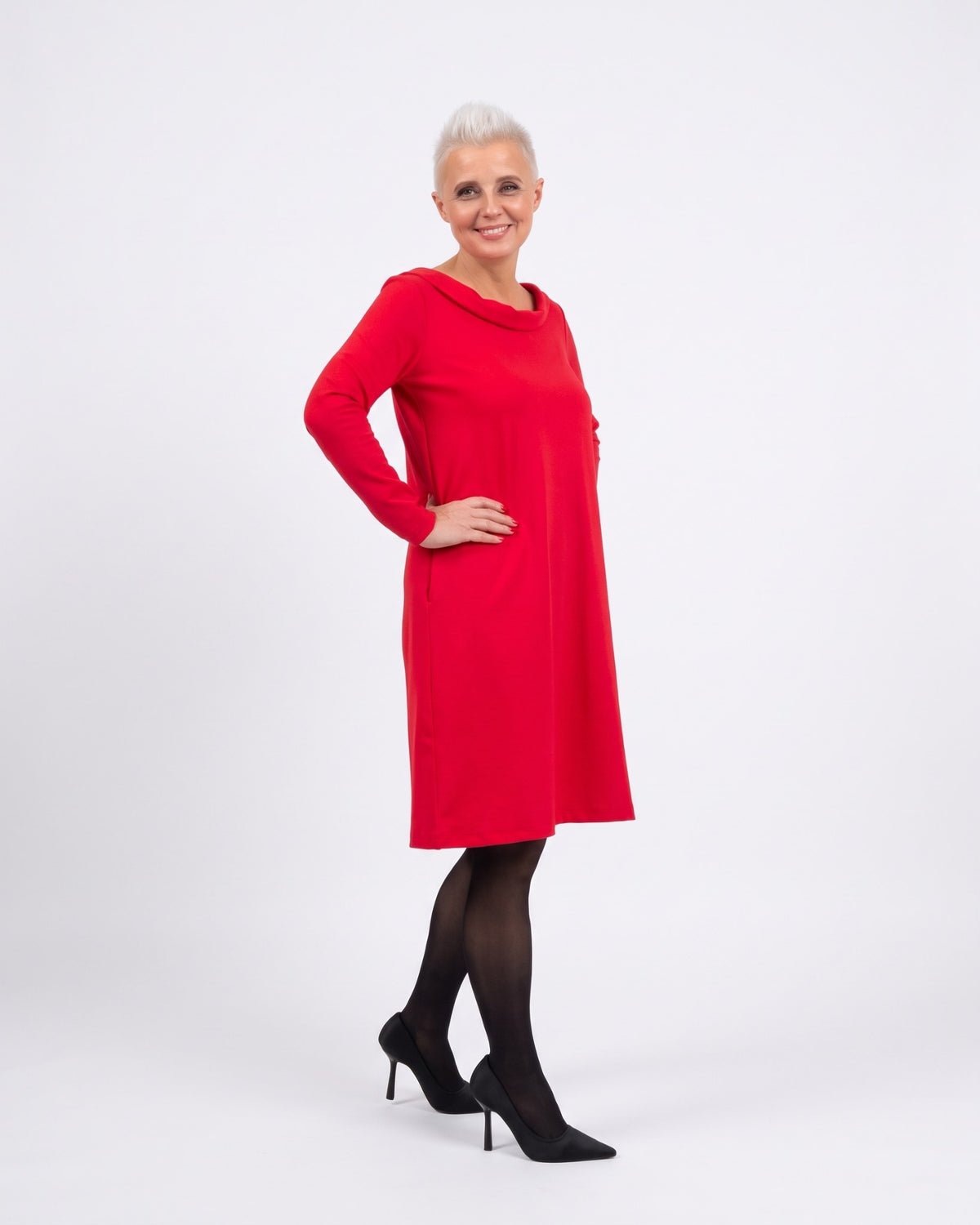 STORY Punto Milano – red dress, side view showing how the A-line skirt falls #Color_Red