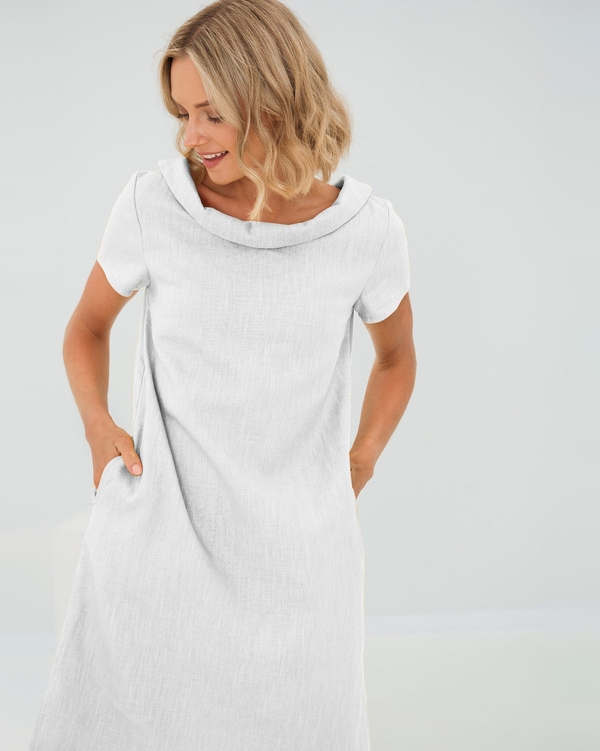 LeMuse STORY linen dress in white – studio front view #Color_White