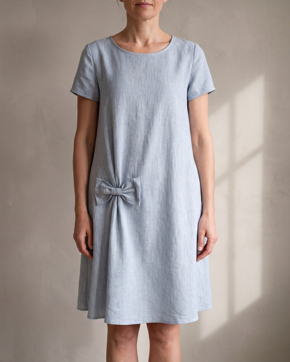 SUMMER KISS light blue linen blend hip bow swing dress, close front view