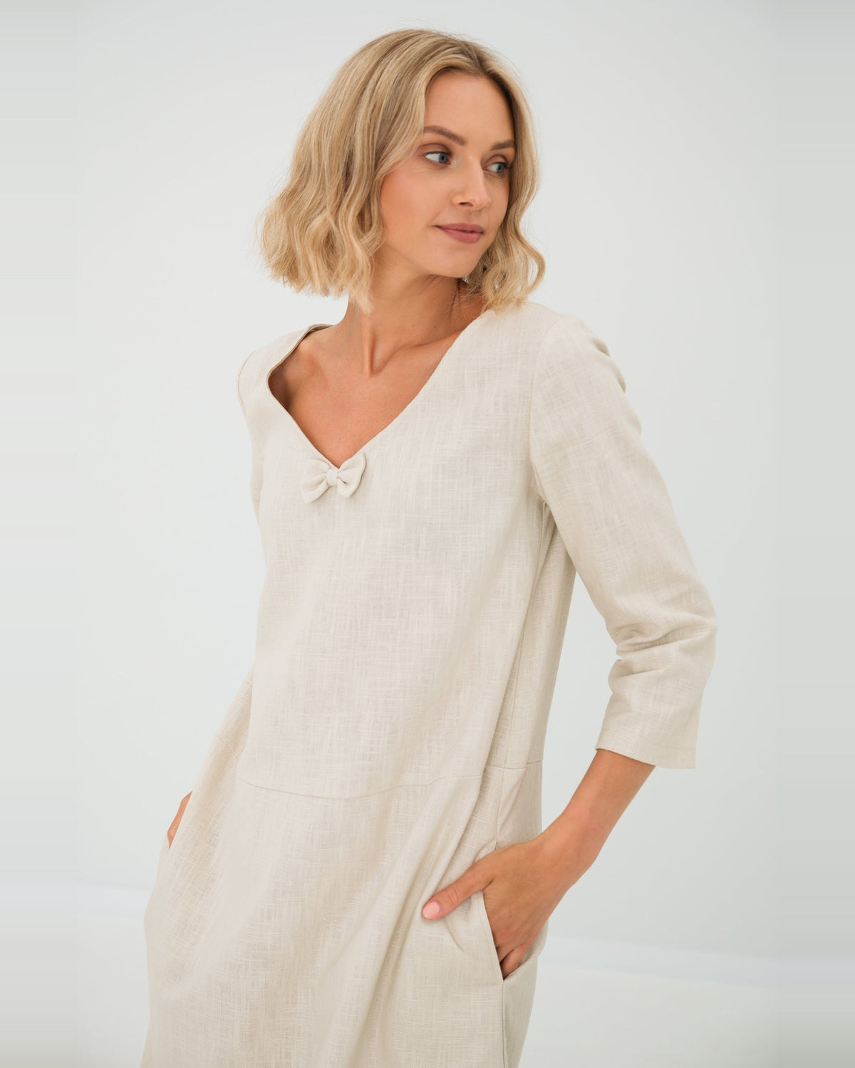 SUN – Linen Blend V-Neck Bow Dress – Beige dress, three-quarter view, studio #Color_Beige