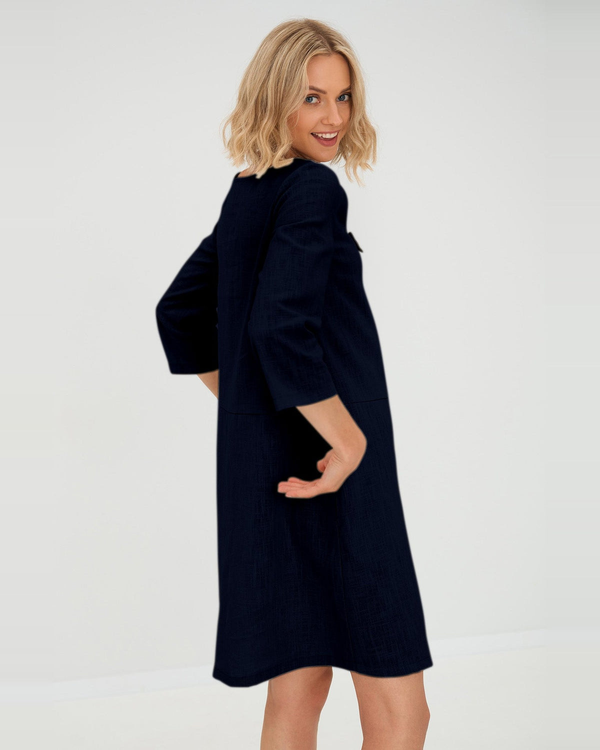 SUN – Linen Blend V-Neck Bow Dress – Deep blue dress, back view over the shoulder, studio #Color_Deep blue