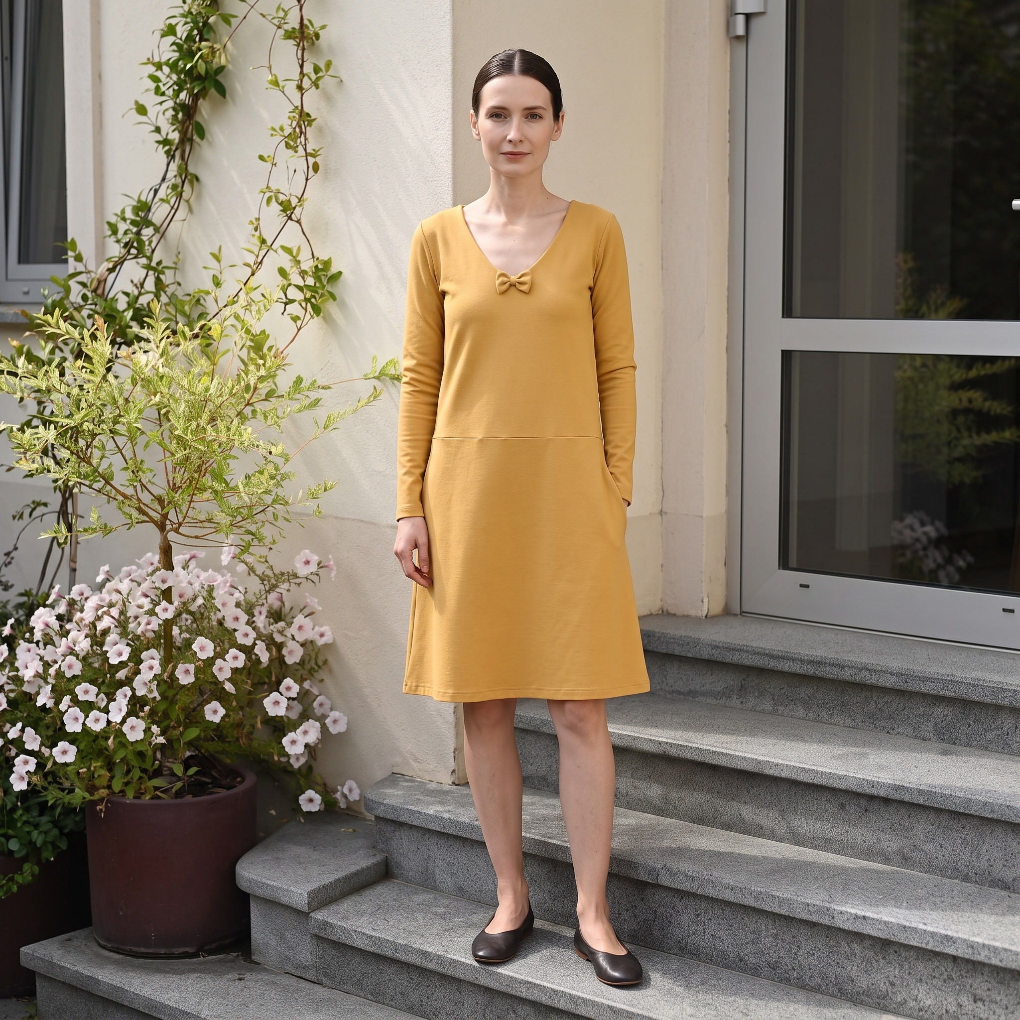 SUN — Italienisches Punto-Milano-Strickkleid in A-Linie mit Schleife