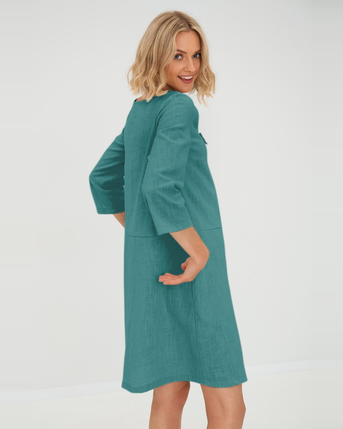SUN – Linen Blend V-Neck Bow Dress – Teal dress, back view over the shoulder, studio #Color_Teal