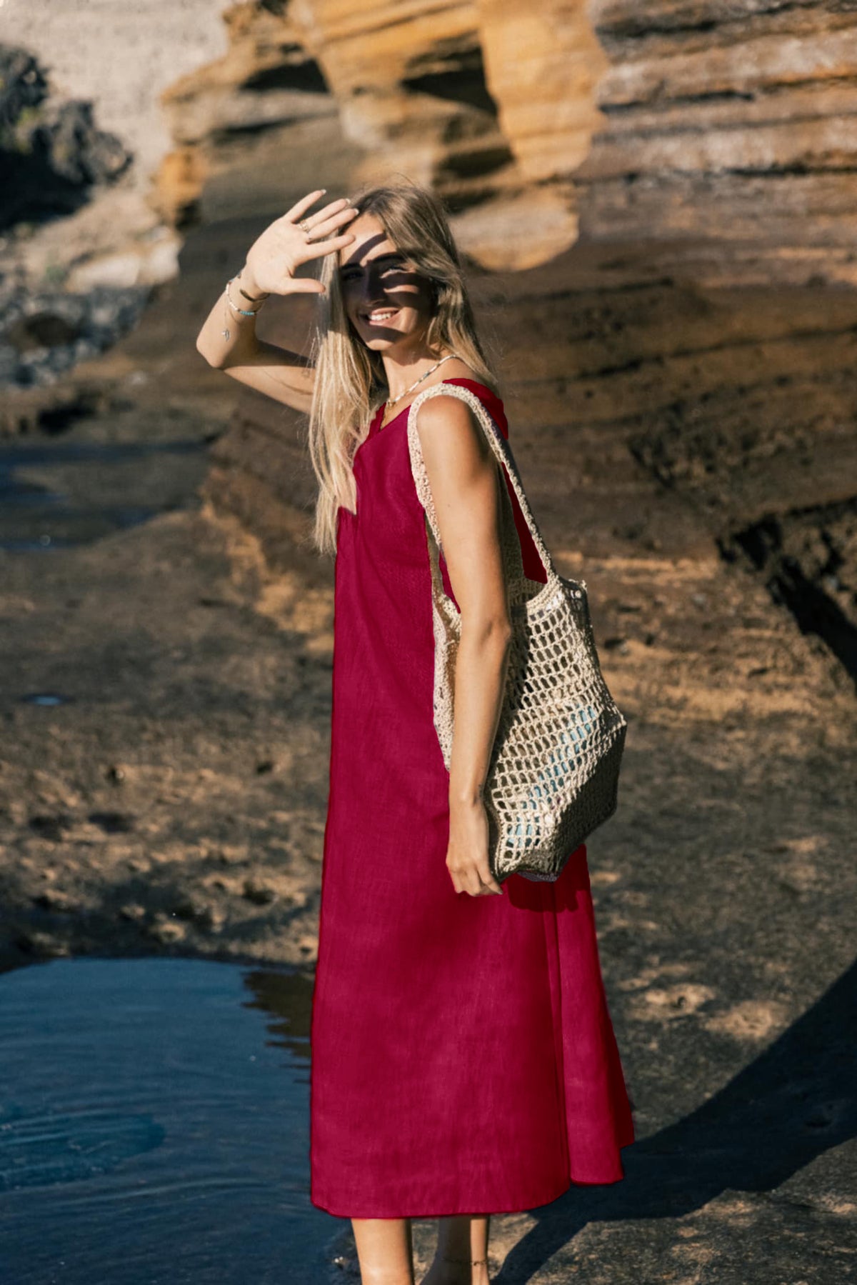 LeMuse SUNSET linen dress in cerise – model front full length by the cliffs #Color_Cerise