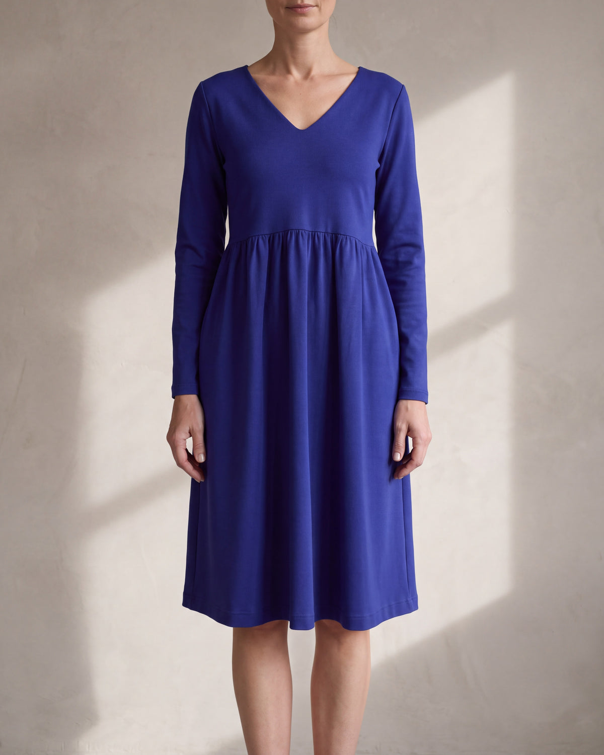 SUNSHINE sapphire blue Punto Milano gathered waist midi dress, close front view