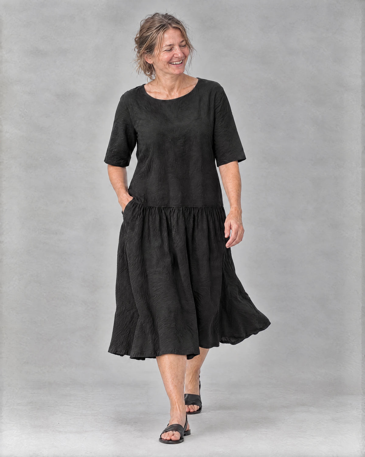 TESSA black linen tiered midi dress in movement