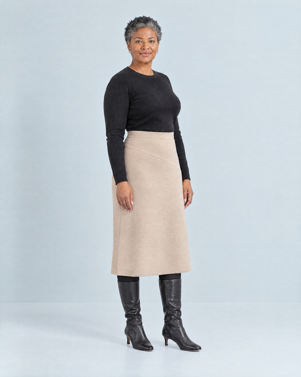 WINTER MIDI wool midi skirt in Beige, three-quarter view