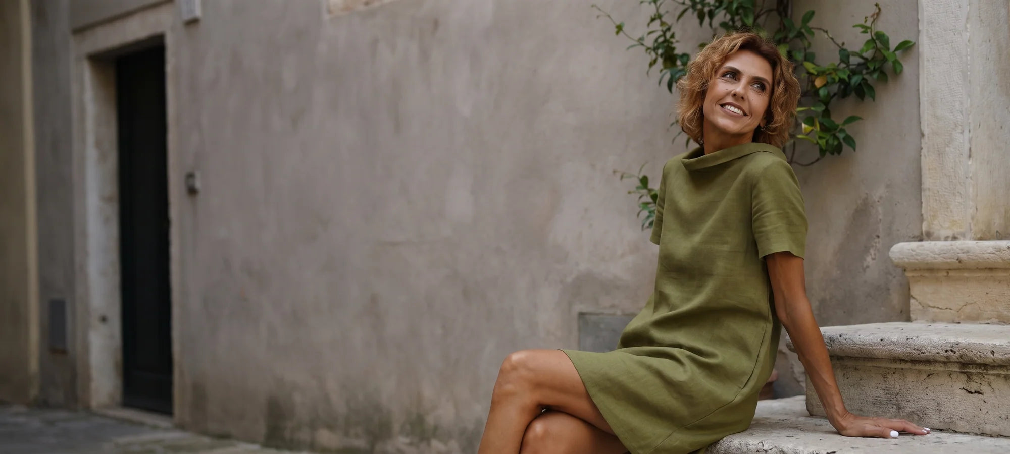 Woman wearing a LeMuse linen dress outdoors